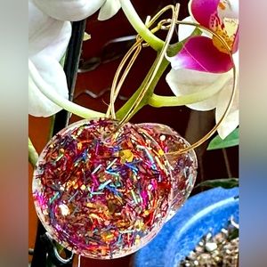 Hand made “life of the party” gold hoops.